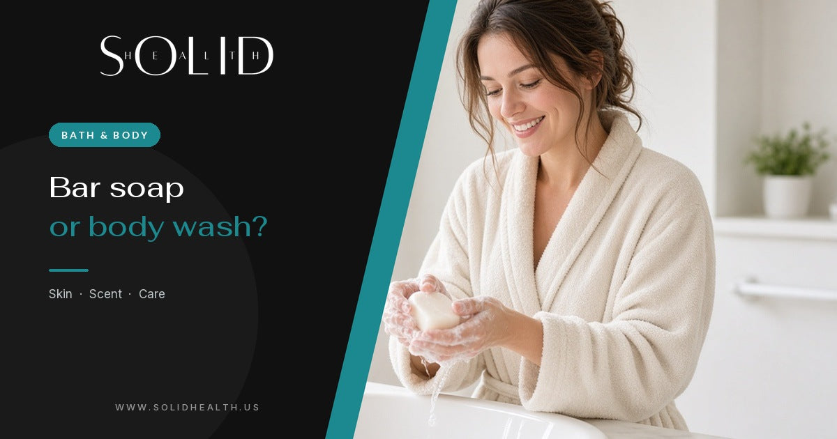 Woman in a bathrobe lathering a bar of soap over a bathtub