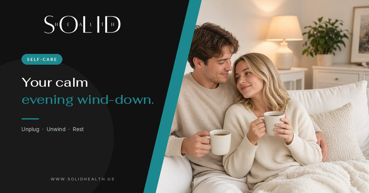 Couple relaxing on a sofa with warm mugs during a calm evening