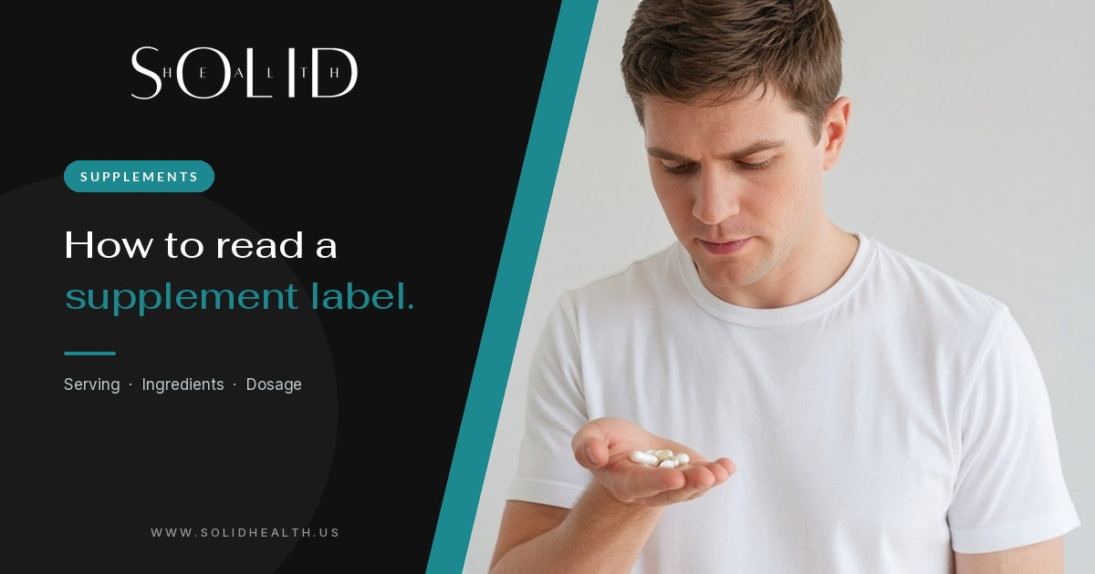 Man looking at a handful of supplement capsules in his palm